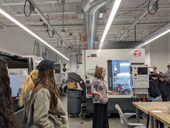 Lindsey Hegemann, CGCC Advanced Manufacturing instructor, shares insights with students about careers and hands-on training in the College’s manufacturing lab during the Next Steps in The Gorge event.