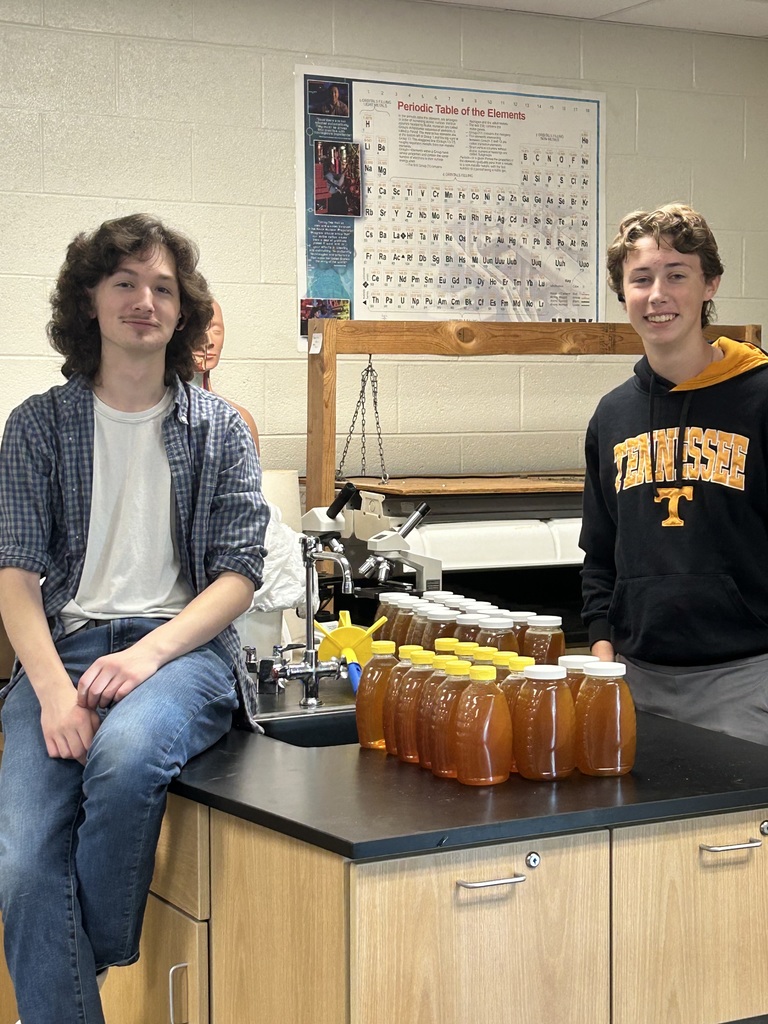 Horticulture students with their honey jars