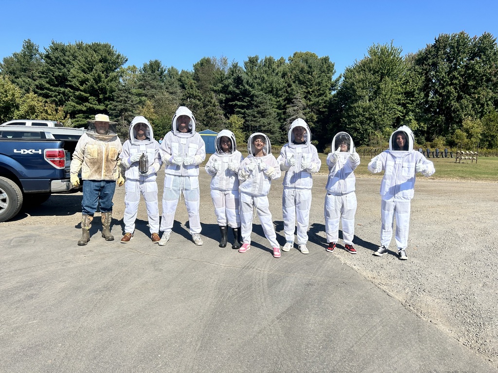 Mr. Wesche and his students in their bee uniforms