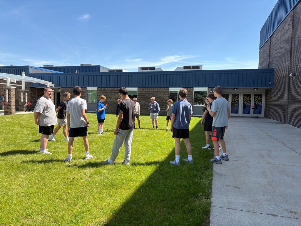 Boys playing Hacky Sack
