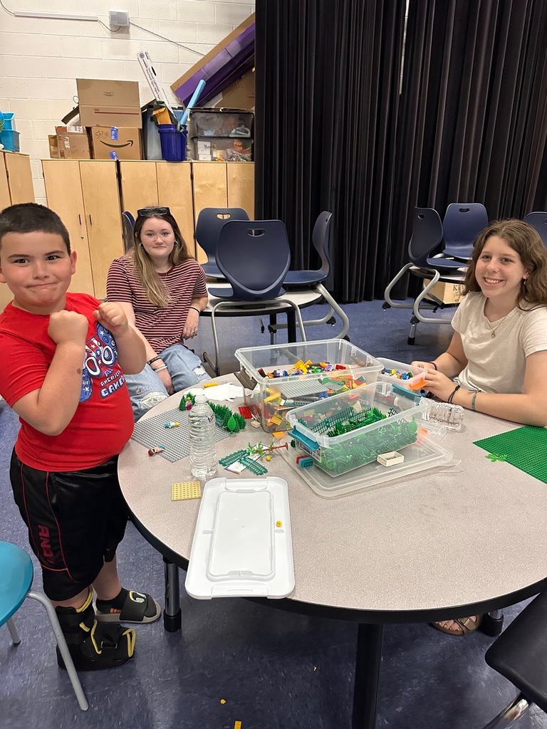 student building with legos