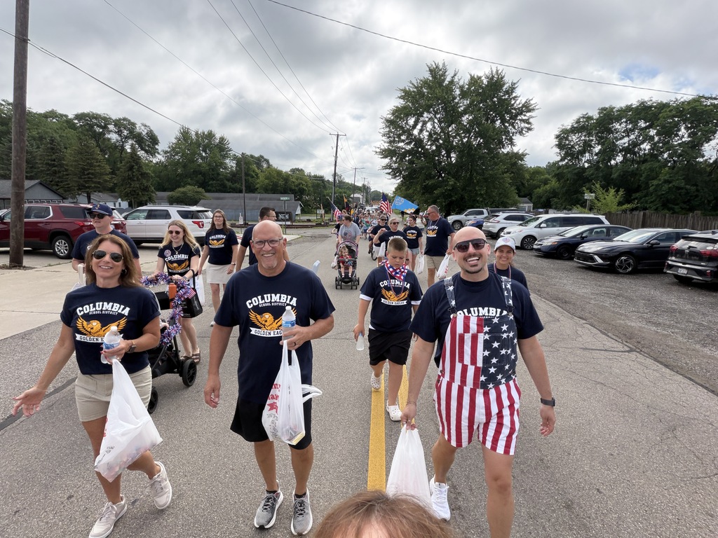 Columbia Staff and Students Walking in parade