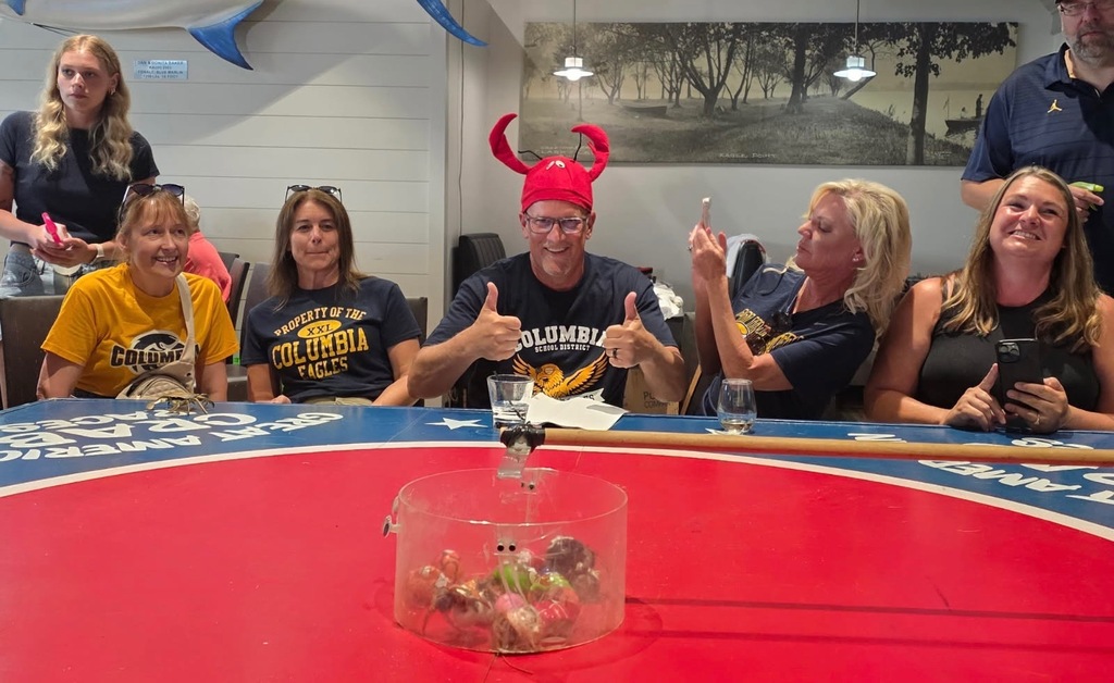 Superintendent Jim Baker weaing the crab hat