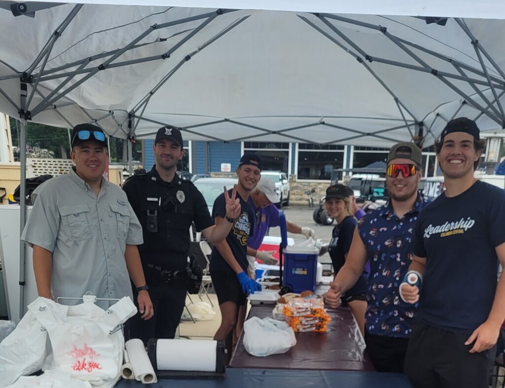 Students helping serve Chicken dinners for the Lions Club Fundraiser at the Raft-O-Rama