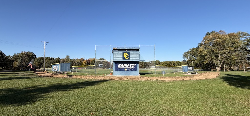 Picture of digging for new sidewalk around baseball fields