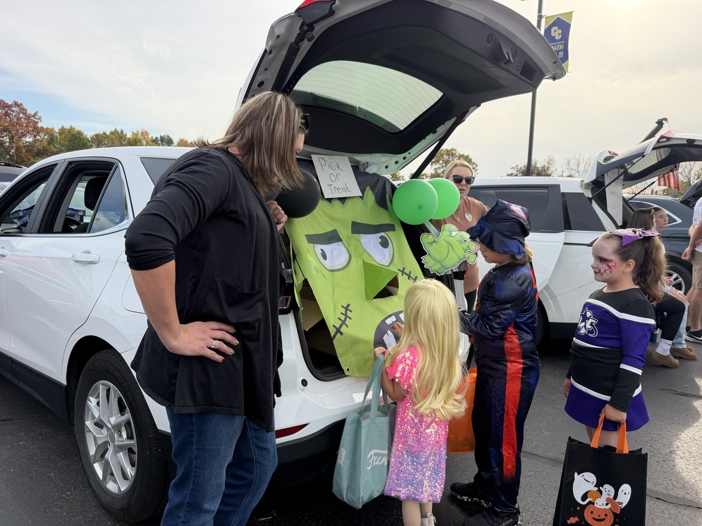 Kids getting treats from Frankenstein
