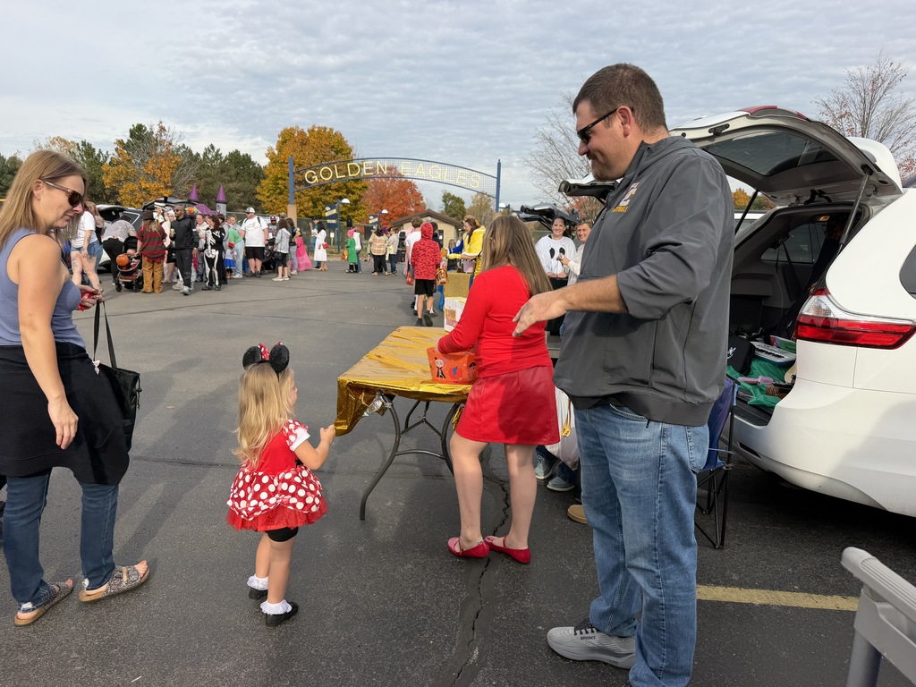 Little girl as Minnie Mouse getting candy at CCHS