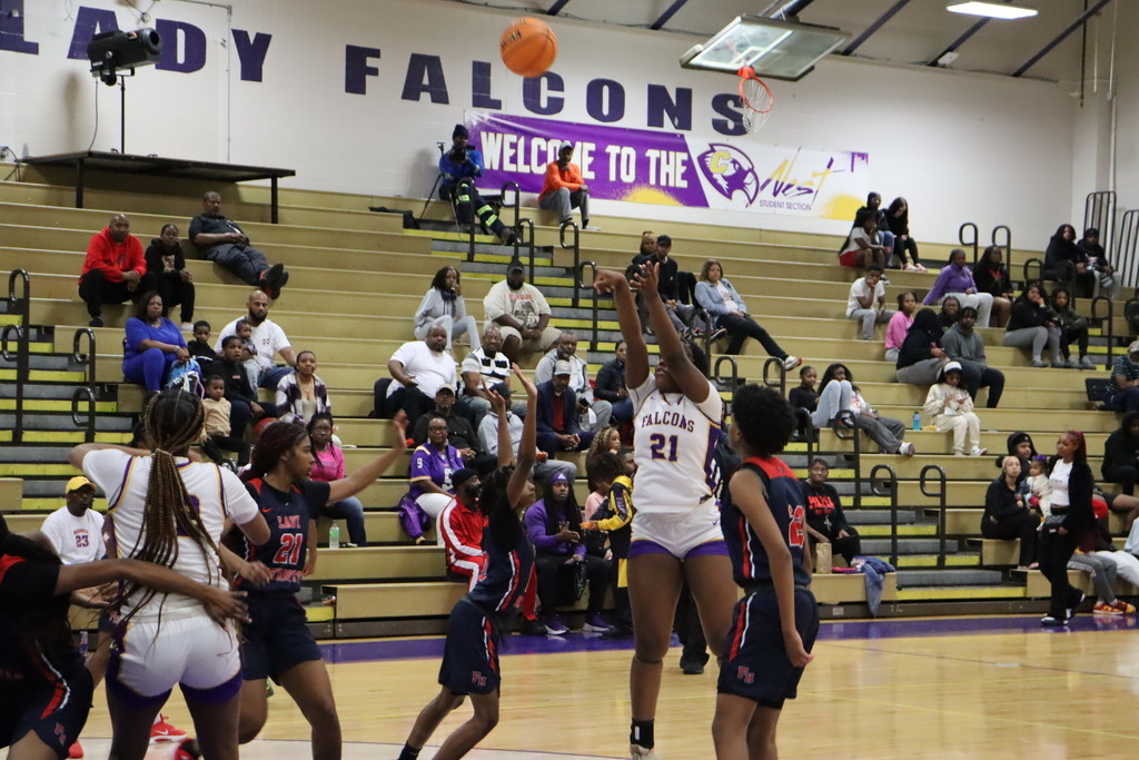 The Lady Falcons take a shot against Forest Hill