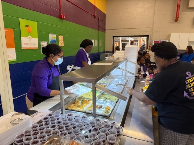 Sale Elementary students eat a Thanksgiving meal