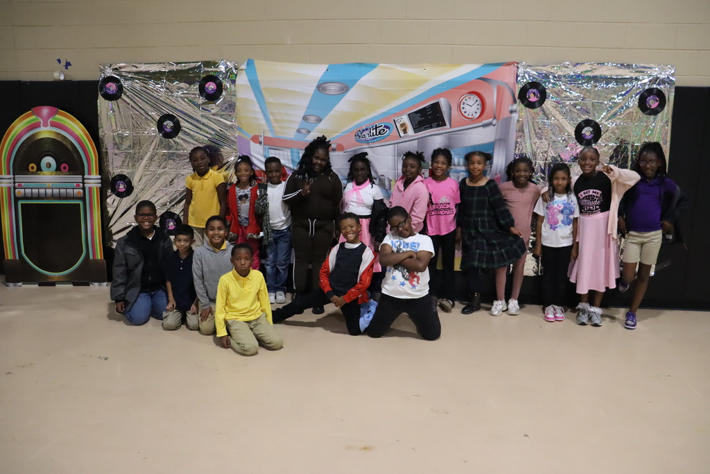 Sale Elementary students have fun at a sock hop.