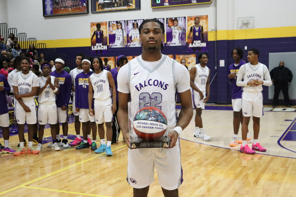 Michael Hood is honored for scoring 1,000 points during his Columbus High basketball career.