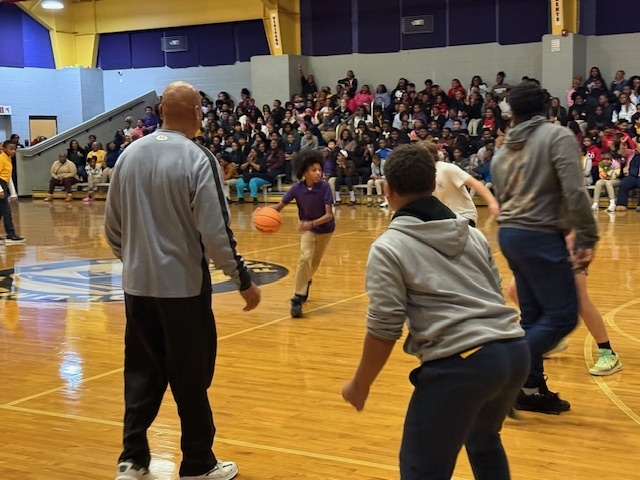 CMS students celebrated mid-year test assessment scores with a basketball game, playing  against their teachers