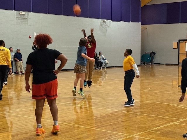 CMS students take on the teachers in a basketball game.