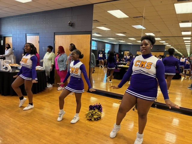 CMS Cheerleaders support the basketball team