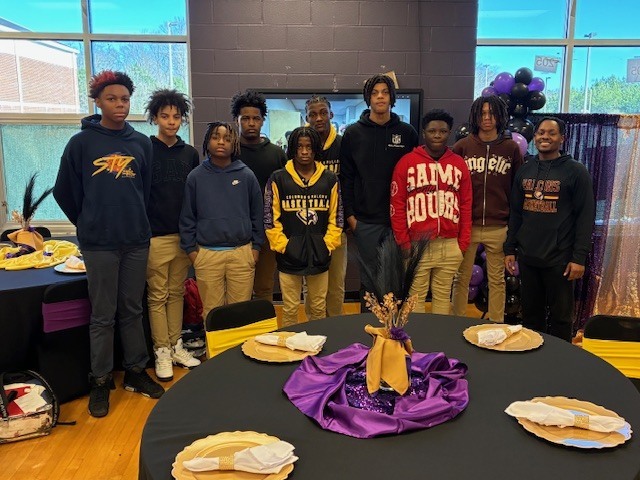 CMS Basketball team celebrates going 14-4 on the season.