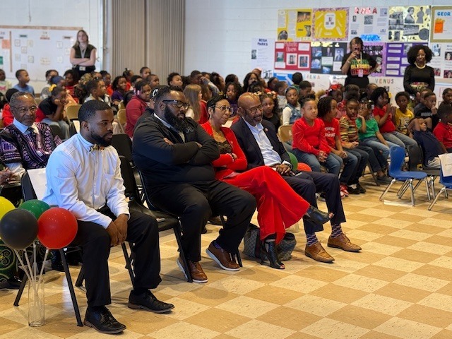 City leaders and school board members watch Fairview Elementary's Black History Month program. 