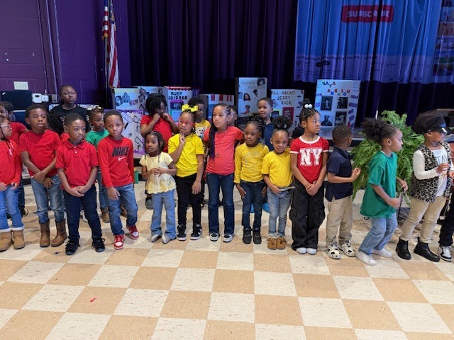 Fairview Elementary students stand in front of the crowd after the Black History Month program has ended.