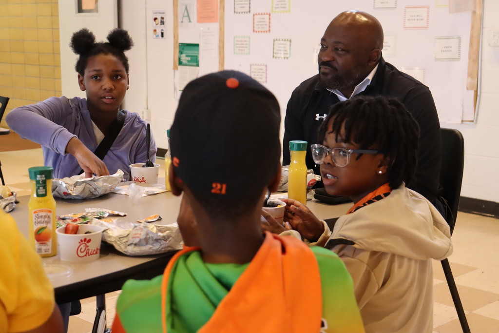 Fairview students talk with Mr. Chapman. 