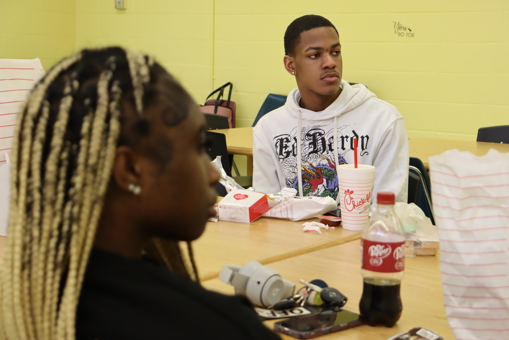 Columbus High students talk with Mr. Chapman. 