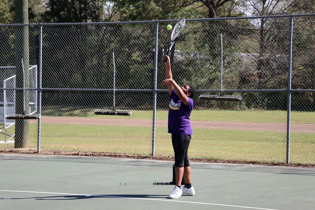 CHS player on the tennis court.