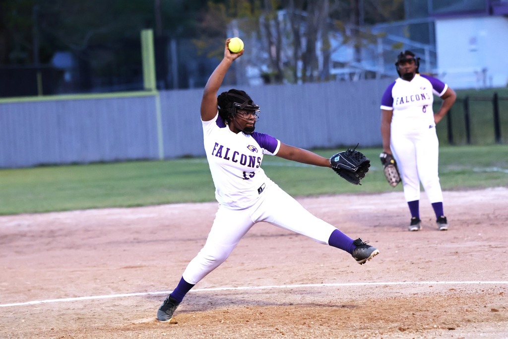 CHS softball player pitches the ball. 