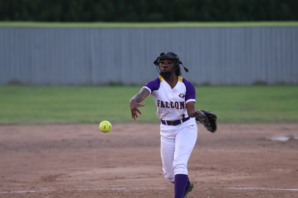 CHS Softball player pitches the ball.