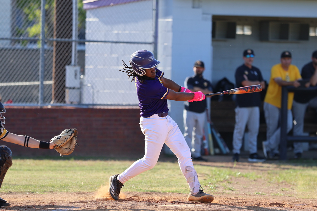 A CHS baseball player swings the bat. 