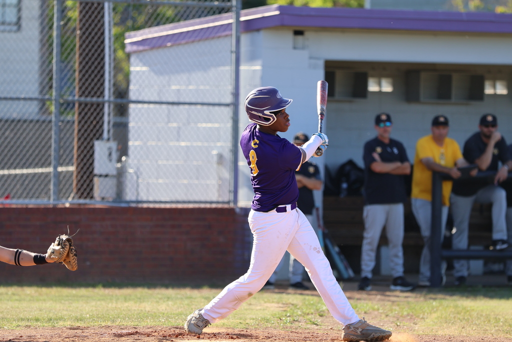 A CHS baseball player swings the bat. 