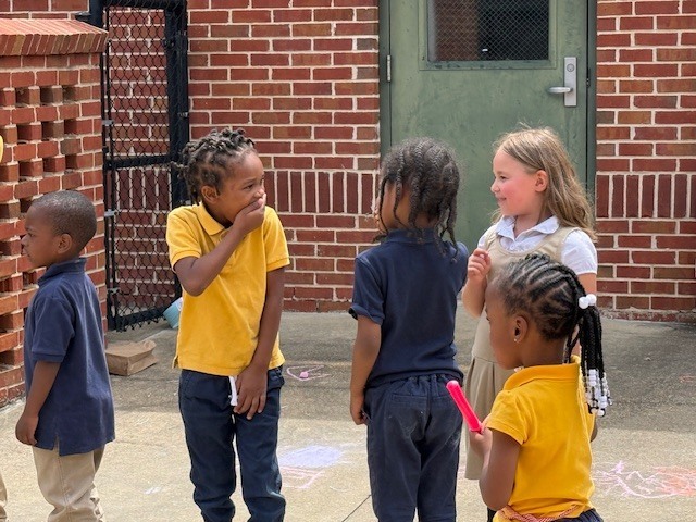 Stokes-Beard Elementary students play during a National Kindergarten Day celebration at the school. 