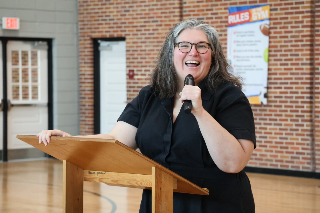 Friendly City Books Founder and Owner Emily Liner speaks to Hunt Intermediate students at an Earth Day event.