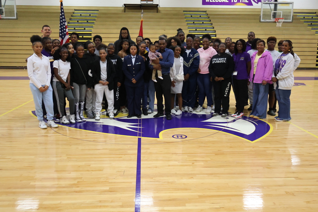 Friends pose after NiJayhia Capron's enlistment ceremony