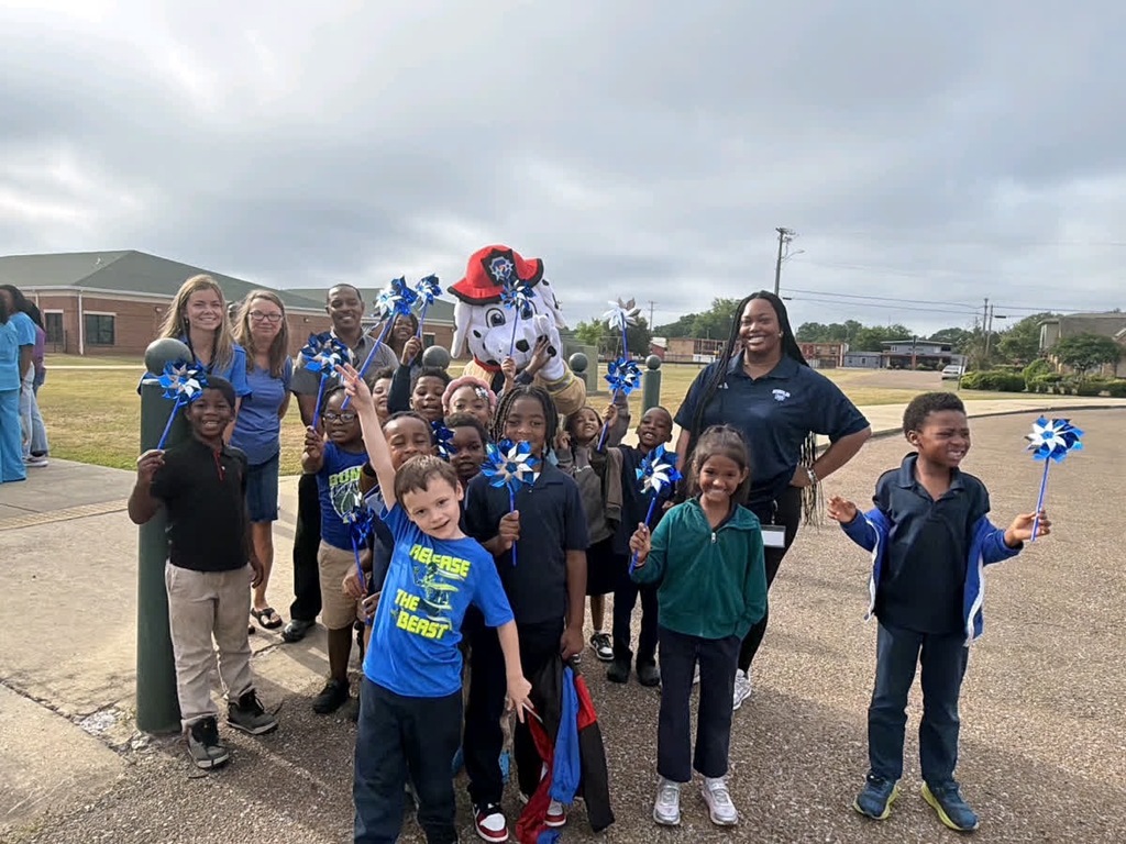 Stokes-Beard Elementary students participate in a Child Abuse Prevention Month parade last week. 