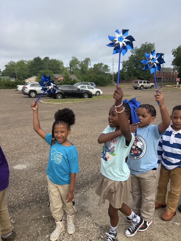 Stokes-Beard Elementary students participate in a Child Abuse Prevention Month parade last week. 