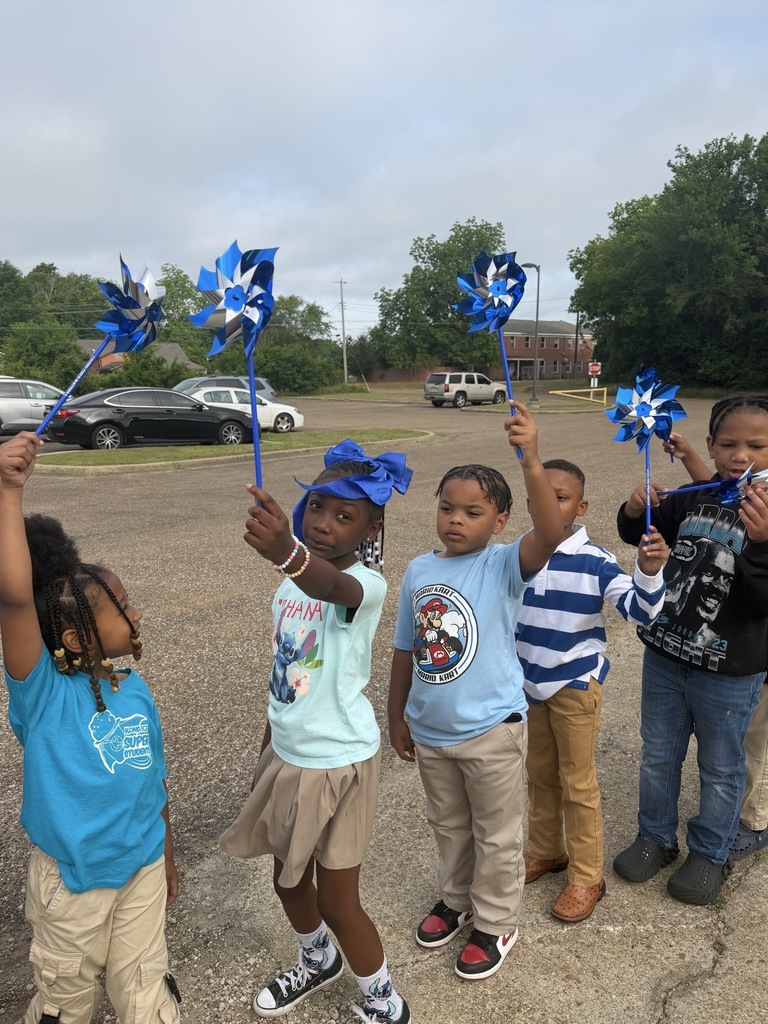 Stokes-Beard Elementary students participate in a Child Abuse Prevention Month parade last week. 