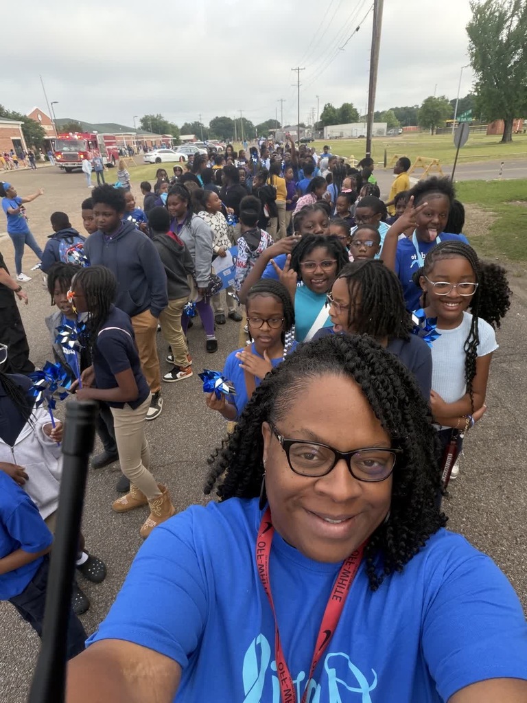 Stokes-Beard Elementary students participate in a Child Abuse Prevention Month parade last week. 