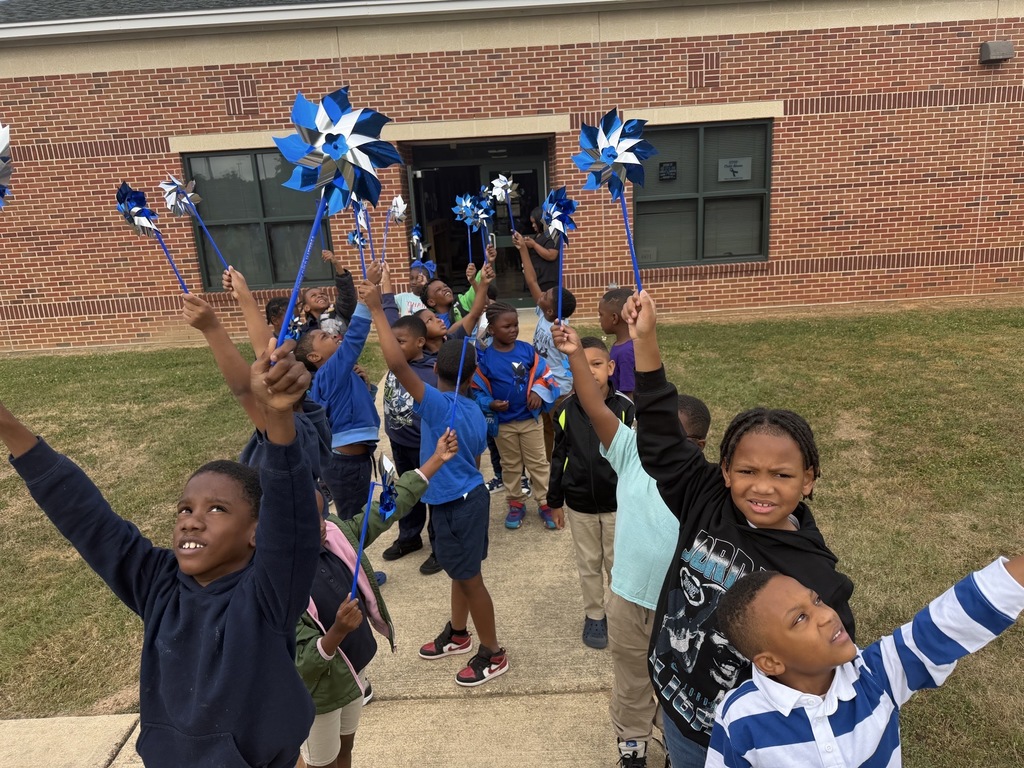 Stokes-Beard Elementary students participate in a Child Abuse Prevention Month parade last week. 