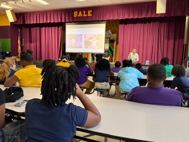 Sale Elementary students listen to author Max Brallier speak. 