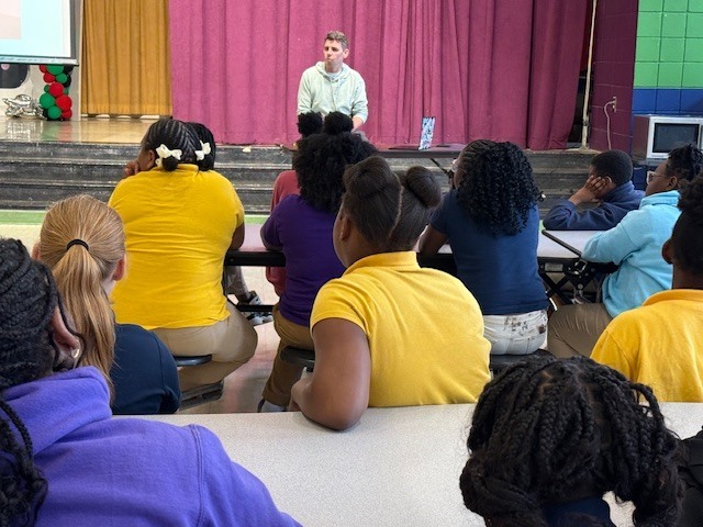 Sale Elementary students listen to author Max Brallier speak. 