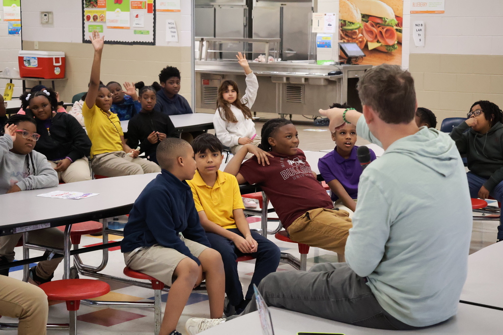 Stokes Beard Elementary students listen to author Max Brallier speak. 
