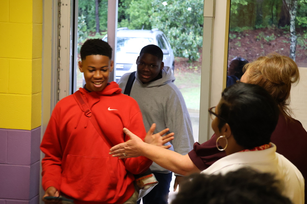 CMSD central office staff cheer on Columbus Middle School students before they take state tests. 
