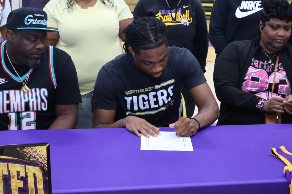 Michael Hood Jr. signs to play basketball with Northeast Mississippi Community College. 