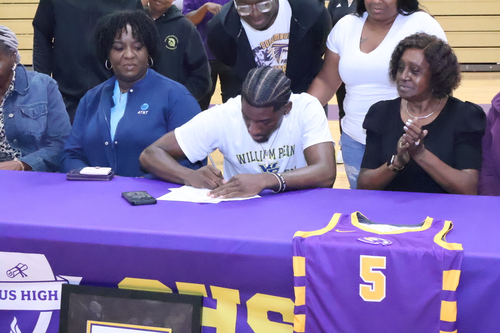 Courtney Perry signs to play college basketball at William Penn University. 