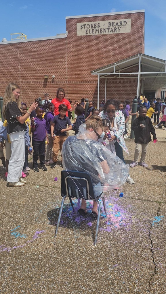 A Stokes Beard Elementary student sprays  silly string on a teacher.
