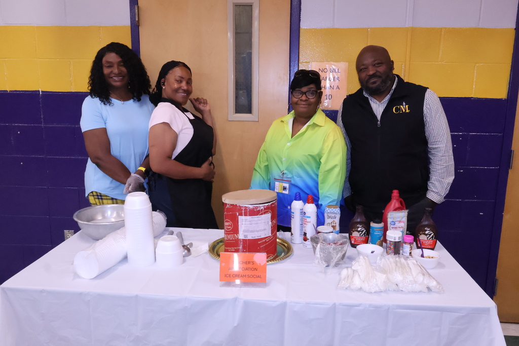 Central office staff serve teachers at Columbus High ice cream. 