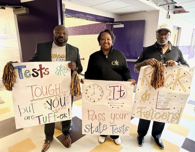 CMSD Superintendent Dr. Craig Chapman & Board of Trustees members cheer on Columbus High School students before they take state tests. 