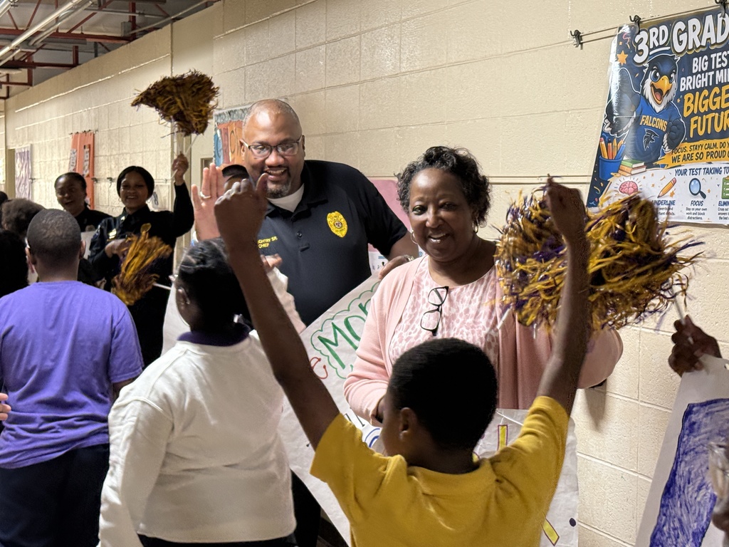 Fairview Elementary students are greeted to cheers during the "No Crumbs" event that happens before state testing. 