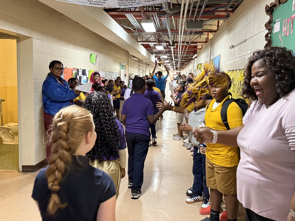 Fairview Elementary students are greeted to cheers during the "No Crumbs" event that happens before state testing. 