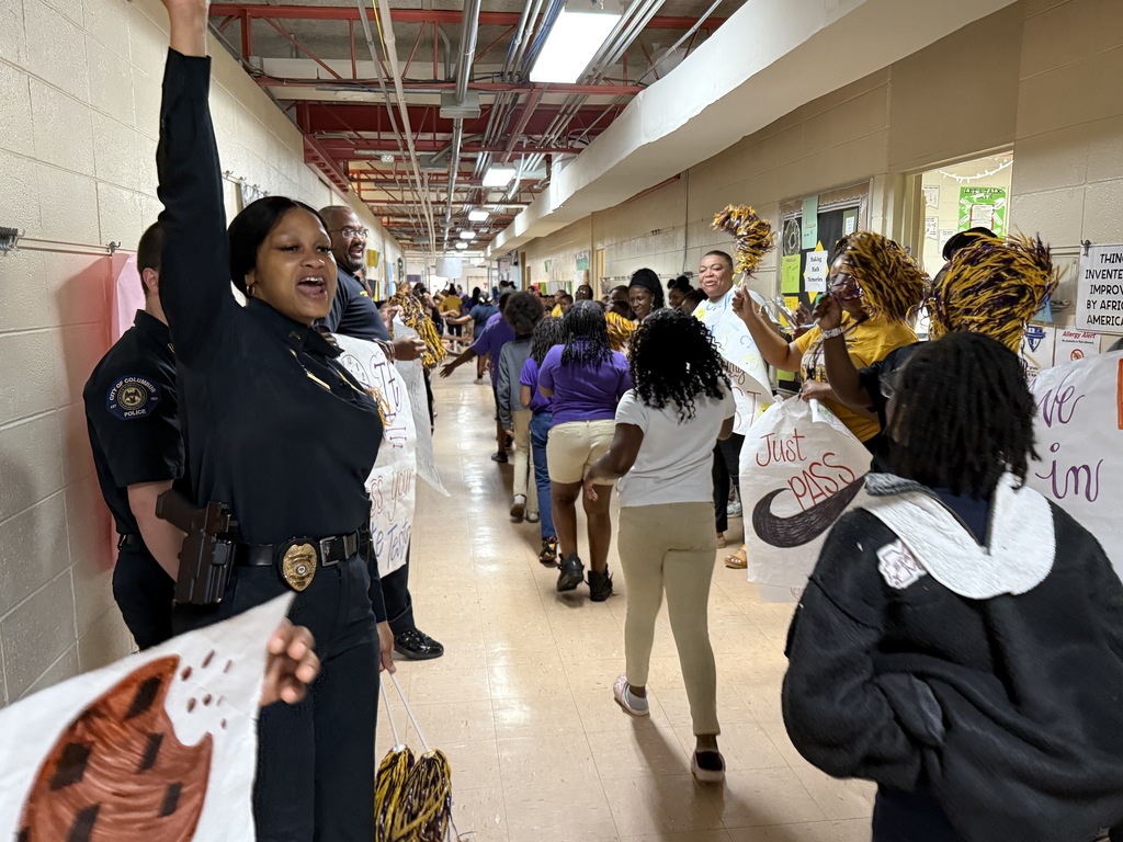 Fairview Elementary students are greeted to cheers during the "No Crumbs" event that happens before state testing. 