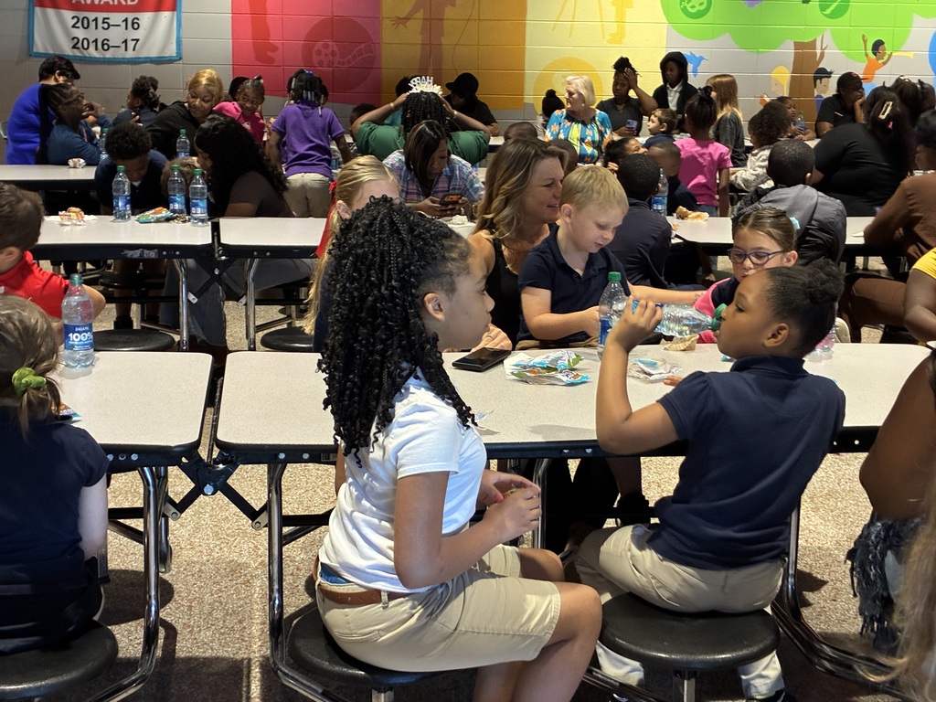 Students at Cook Elementary enjoy "Muffins with Mom" on Friday morning. 