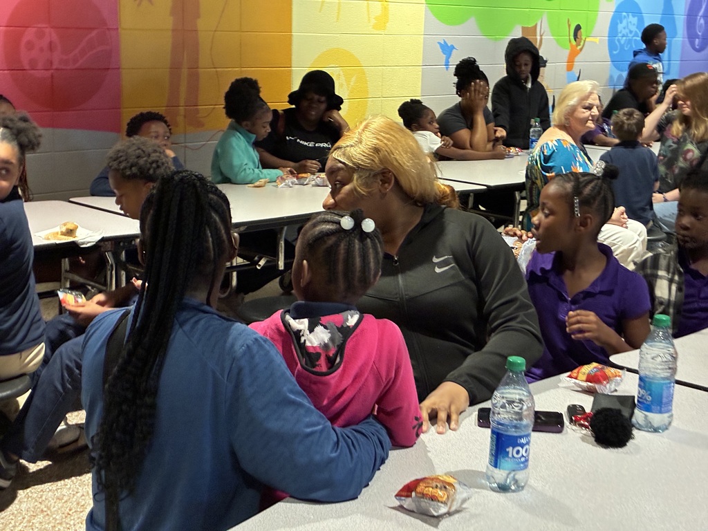 Students at Cook Elementary enjoy "Muffins with Mom" on Friday morning. 